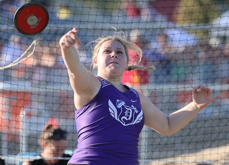 Dixon’s Ella Davidson competes in the discus finals Friday, May 15, 2026, during the Class 2A girls track sectional at Genoa-Kingston High School.