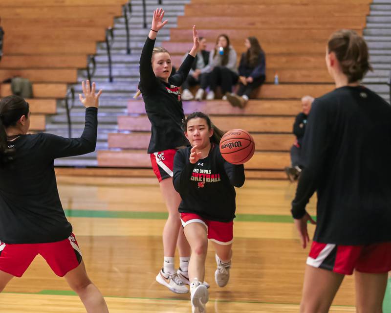 Hinsdale Central goes through pregame drills before basketball game between Hinsdale Central at York. Dec 8, 2023.