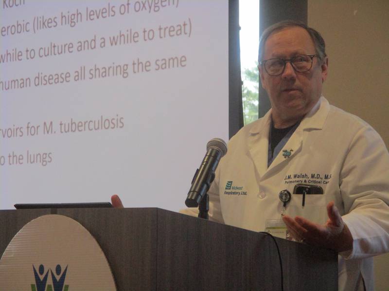 Dr. John Walsh, a pulmonologist, speaks Monday at an event marking the 100th year for the Sunny Hill Tuberculosis Clinic. March 24, 2025