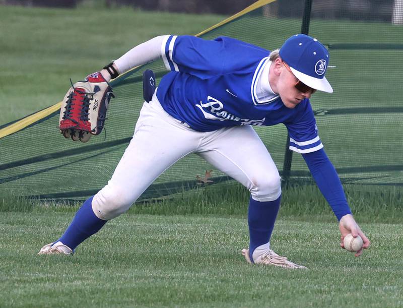 Hinckley-Big Rock's McKinley Shelton barehands a ball in the outfield during their game against Indian Creek Monday, April 29, 2024, at Indian Creek High School.