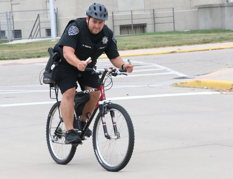 Oglesby Police officer Wes Budach takes off on a Schwinn Ebike from the Oglesby Police Station on Wednesday, Sept. 6, 2023. The City of Oglesby has brought back it's bike patrol. The bikes will allow officers to quickly respond to law-enforcement and medical needs. It can also be used for events in town when it gets crowded.