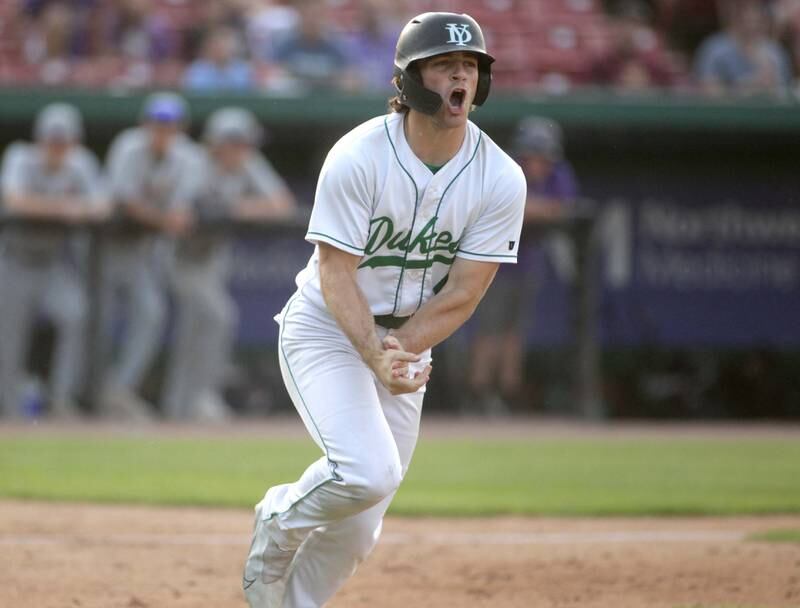 York’s Matt Barton celebrates a walk during the Class 4A Kane County Supersectional against Hononegah at Northwestern Medicine Field in Geneva on Monday, June 5, 2023.