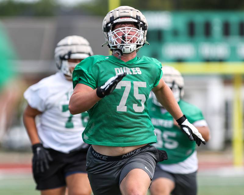 Joe Reiff goes through conditioning drills with the rest of the team at York High School first day of football practice. Aug 12, 2024.