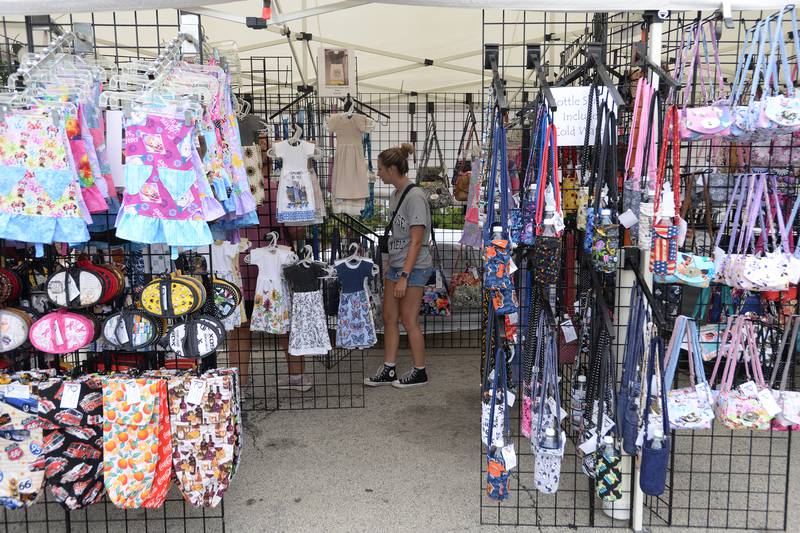 People including Cailey Kremer of Hickery Hills attend the annual La Grange Craft Fair Saturday July 12, 2025.