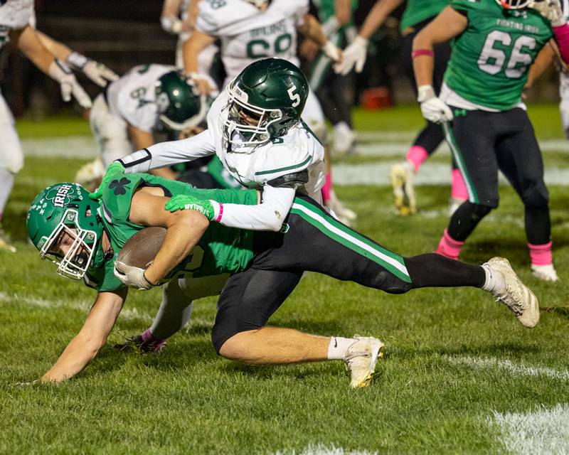 Cam Sriey (33) of Seneca is tackled by Chase Riva (5) of St. Bede after he attempts to run ball on Friday, Oct. 10, 2025 at Seneca High School in Seneca.
