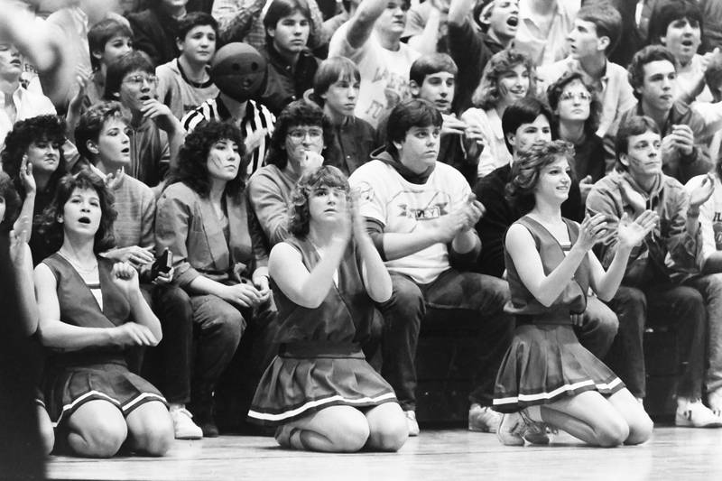 L-P cheerleaders and students cheer during the Regional title game on Saturday, Feb. 28, 1986 at La Salle-Peru Township High School.