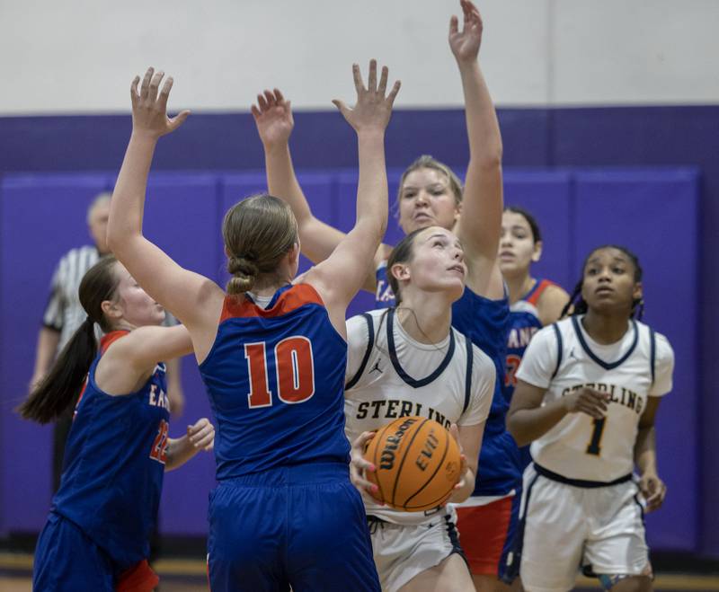 Sterling’s Madison Austin works below the basket against Eastland Thursday, Dec. 26, 2024, during the Dixon Girls Holiday Basketball Tournament.