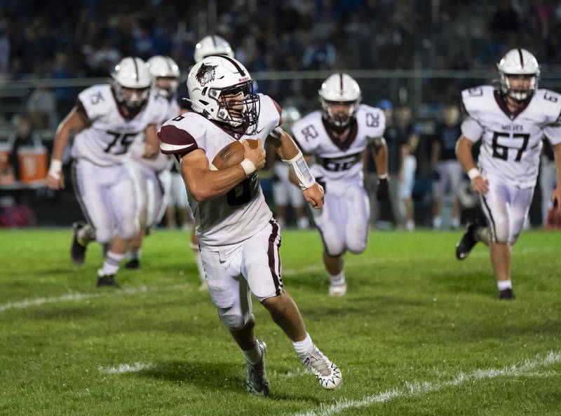Prairie Ridge quarterback Luke Vanderwiel makes a run during their game against Burlington Central on Friday, September 19, 2025 at Burlington Central High School. Ryan Rayburn for Shaw Local