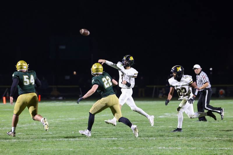 Herscher quarterback Tanner Jones passes the ball during the Tigers' 38-14 loss to Bishop McNamara in the IHSA Class 3A first round playoff game on Friday, Oct. 31, 2025.