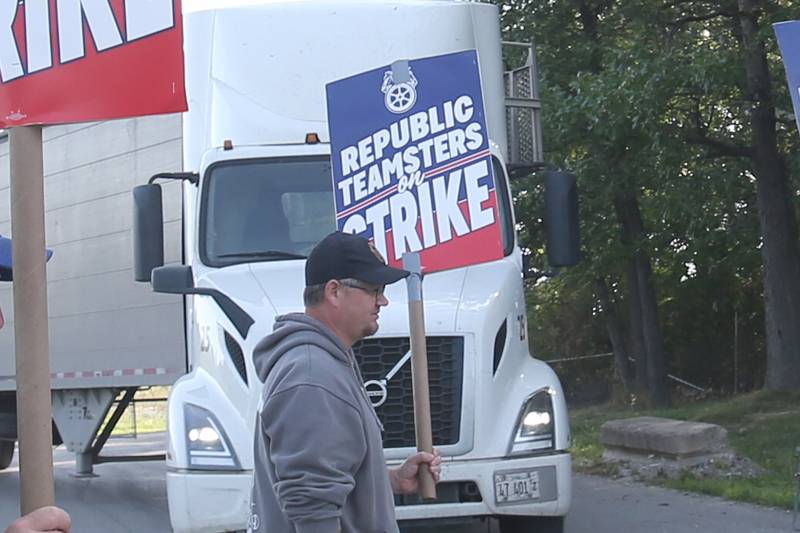 Steve Mills of Republic Services and Teamsters Local 179, pickets in front of the south entrance to Republic Services on Wednesday, July 2, 2025 in Ottawa. The strike involves 25 employees at Republic Services at the Otawa facility. 
The action will disrupt waste collections for tens of thousands of residents throughout LaSalle County. Republic Teamsters are demanding a contract with improved wages, better benefits, and stronger labor protections. The Illinois strike comes after 450 Republic Teamsters in Boston went on strike on Tuesday. Hundreds of additional Teamsters across the country are having similar contract disputes with Republic.