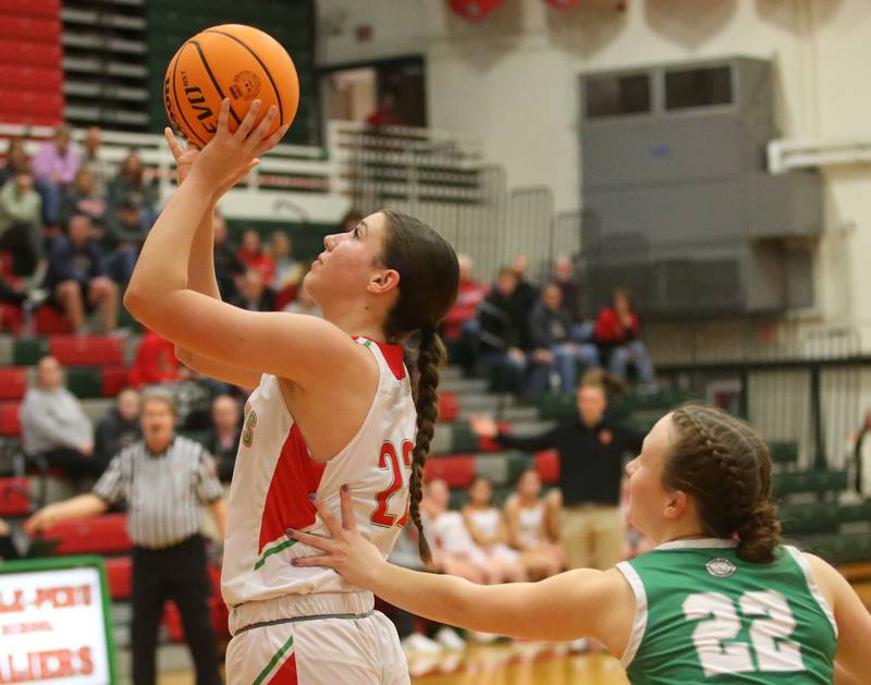 L-P's Brianna Ruppert eyes the hoop while driving in the lane past Geneseo's Viloa Pettit on Tuesday, Feb. 4, 2025 in AJ Sellett Gymnasium at L-P High School.