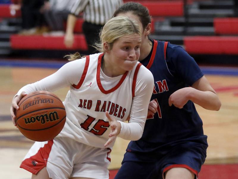 Huntley’s Cece Romano drives to the balks against South Elgin’s Molly Stahl on Tuesday, Nov. 21, 2023, during a basketball game in the Dundee-Crown High School Girls Thanksgiving Tournament in Carpentersville.