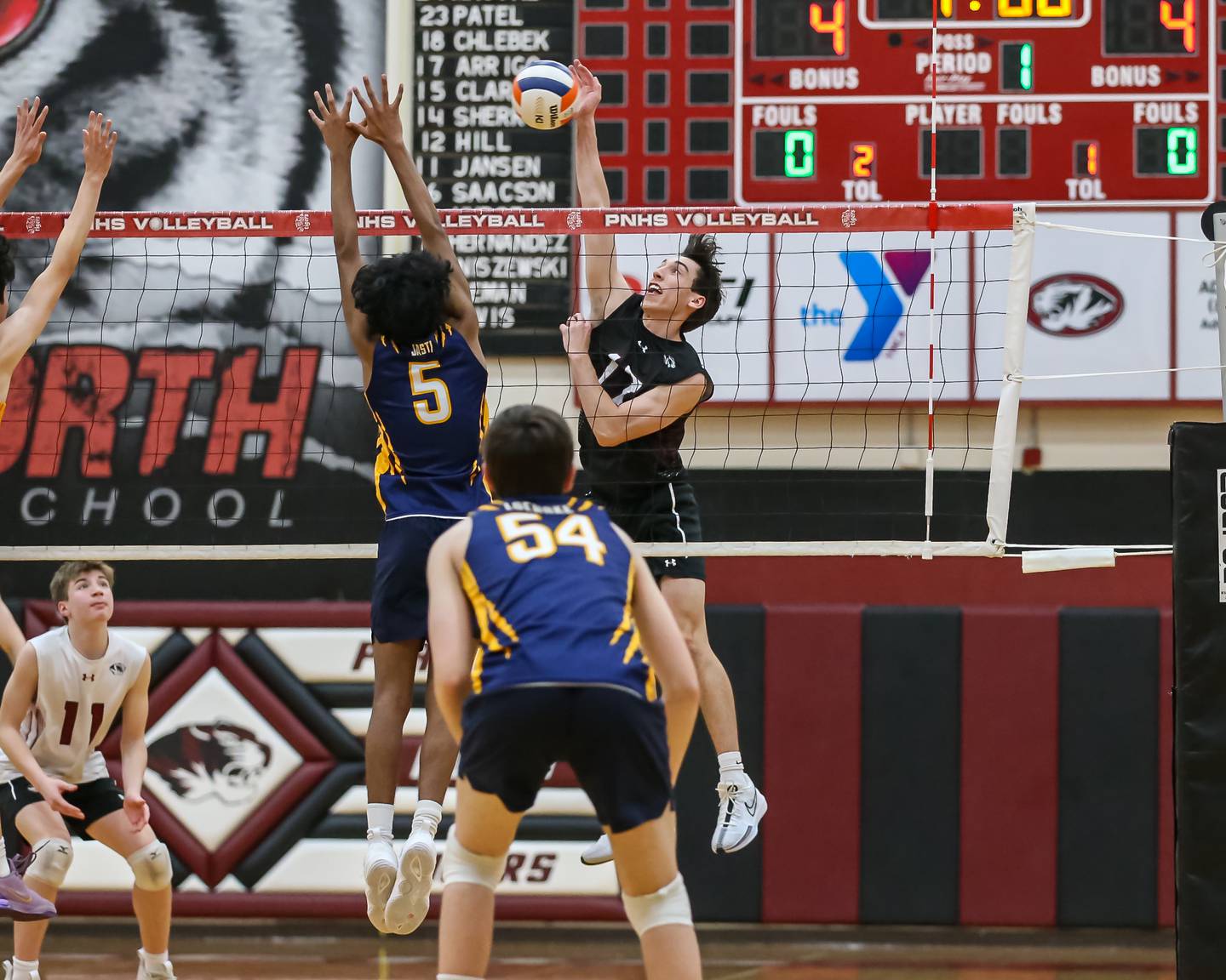 Plainfield North's Jerry Arrigo (17) with a spike during volleyball match between Neuqua Valley at Plainfield North.  April 29, 2024.