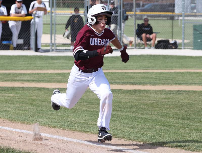 Wheaton Academy's Dominic Murrell beats out an infield single during their Class 3A sectional semifinal against Sycamore Wednesday, May 29, 2024, at the Sycamore Community Sports Complex.