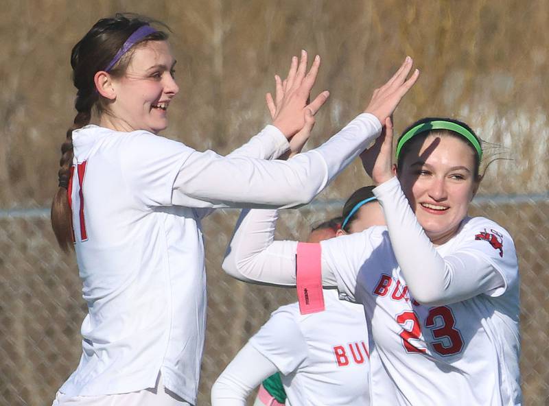 Streator's Jordan Hatzer hi-fibes teammate Aubree Gallick after scoring a goal against L-P on Friday, March 27, 2026 at the L-P athletic complex in La Salle.