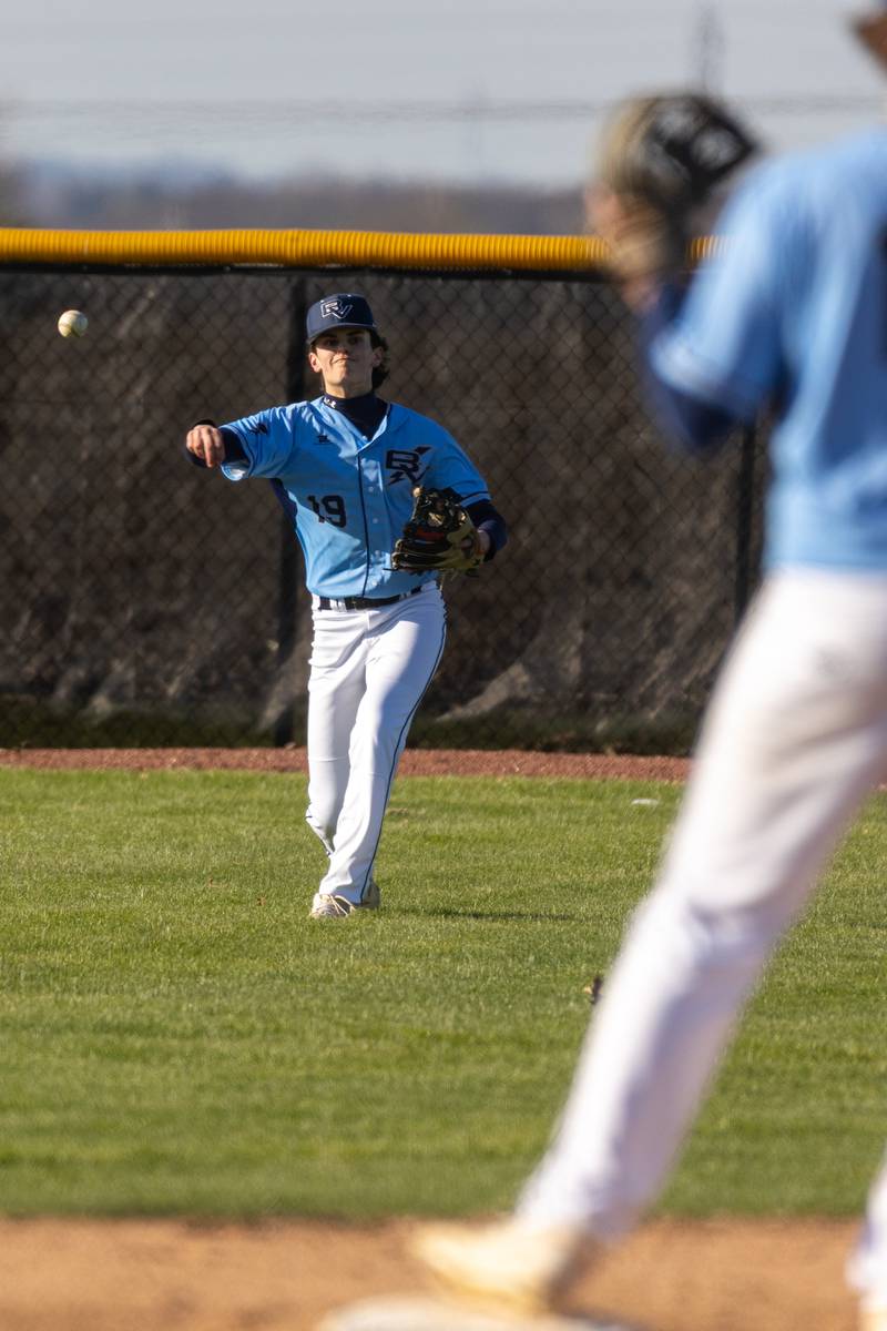 Logan Philhower (19) of Bureau Valley throws ball to second base in attempt to throw out runner on Tuesday, April 8, 2025 at Putnam County High School in Granville.