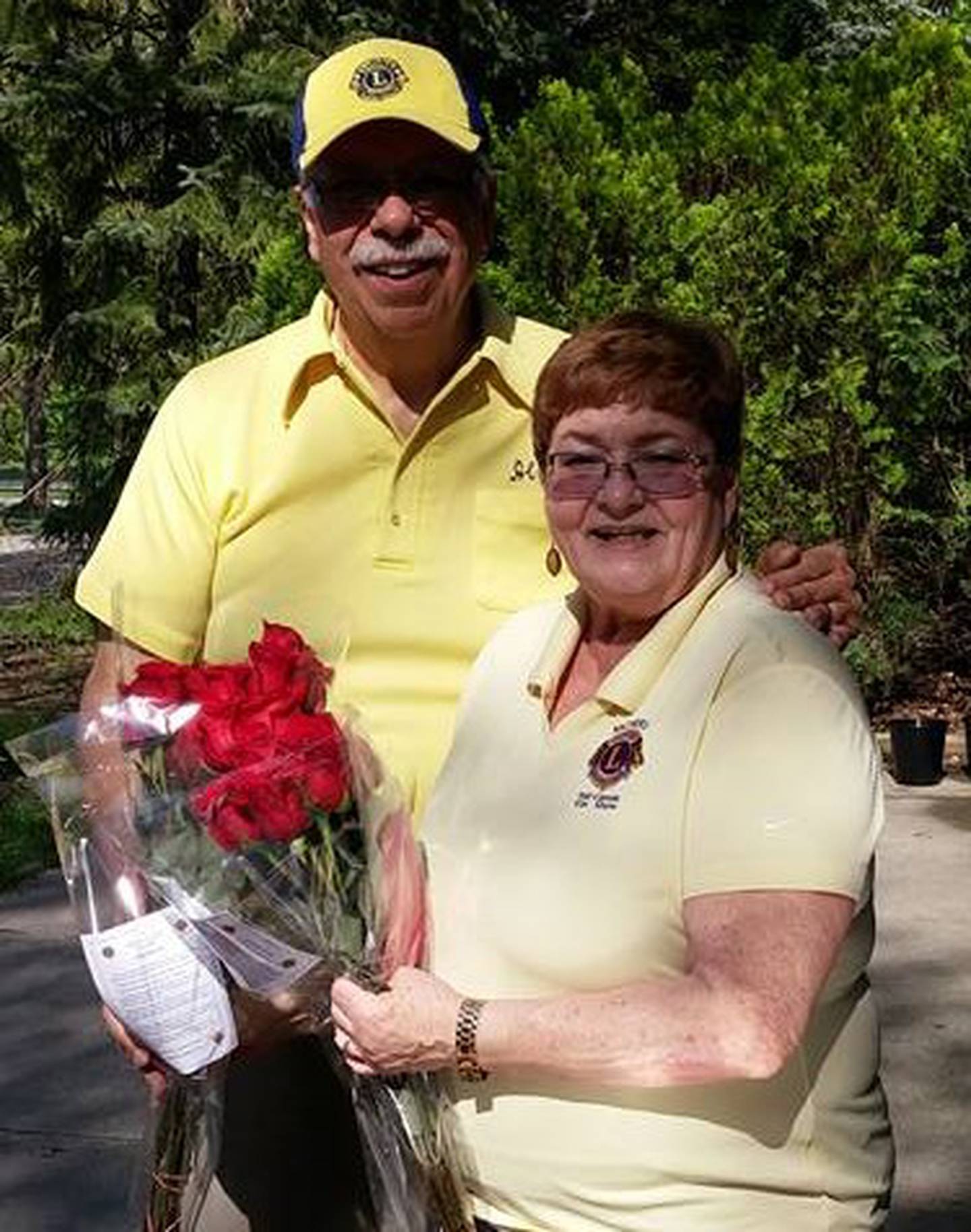 Lions members Al and Judy Miller prepare the Lions Club Mother's Day roses for delivery on May 11 for a $20 donation.