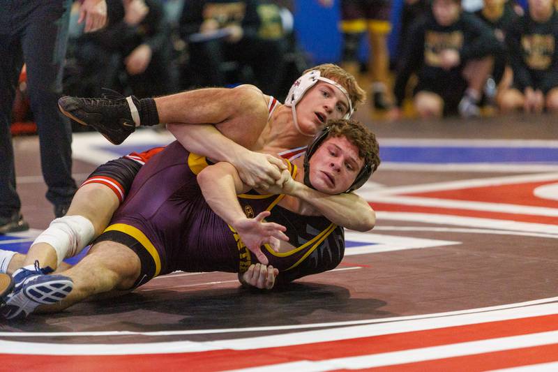 Marist's Thomas Fidler and Montini's Will Konder competes in the 157 lb match  at the Marmion Class  2A Dual Team Sectional on Thursday, Feb. 5,2026 in Aurora.