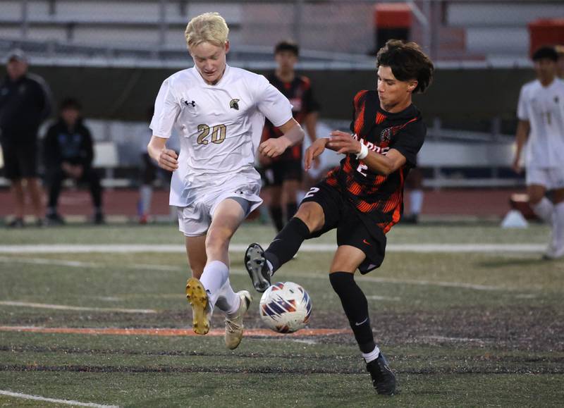 Sycamore's Paxton Nicol (left) and DeKalb's Zach Murray go after the ball during their game Thursday, Oct. 10, 2024, at DeKalb High School.