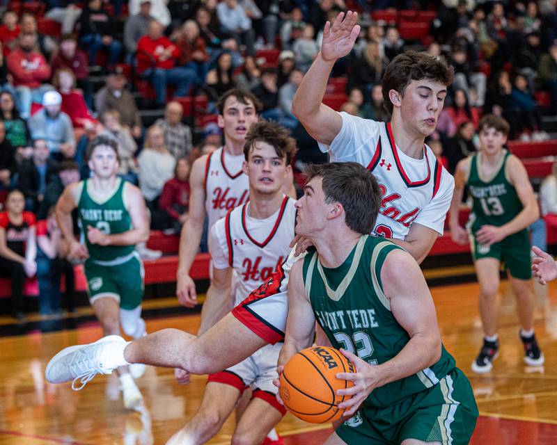 Geno Ferrari (2) of Hall jumps into St. Bede's Aj Hermes (22) as he goes up for shot on Saturday, January 31, 2026 at Hall High School in Spring Valley.