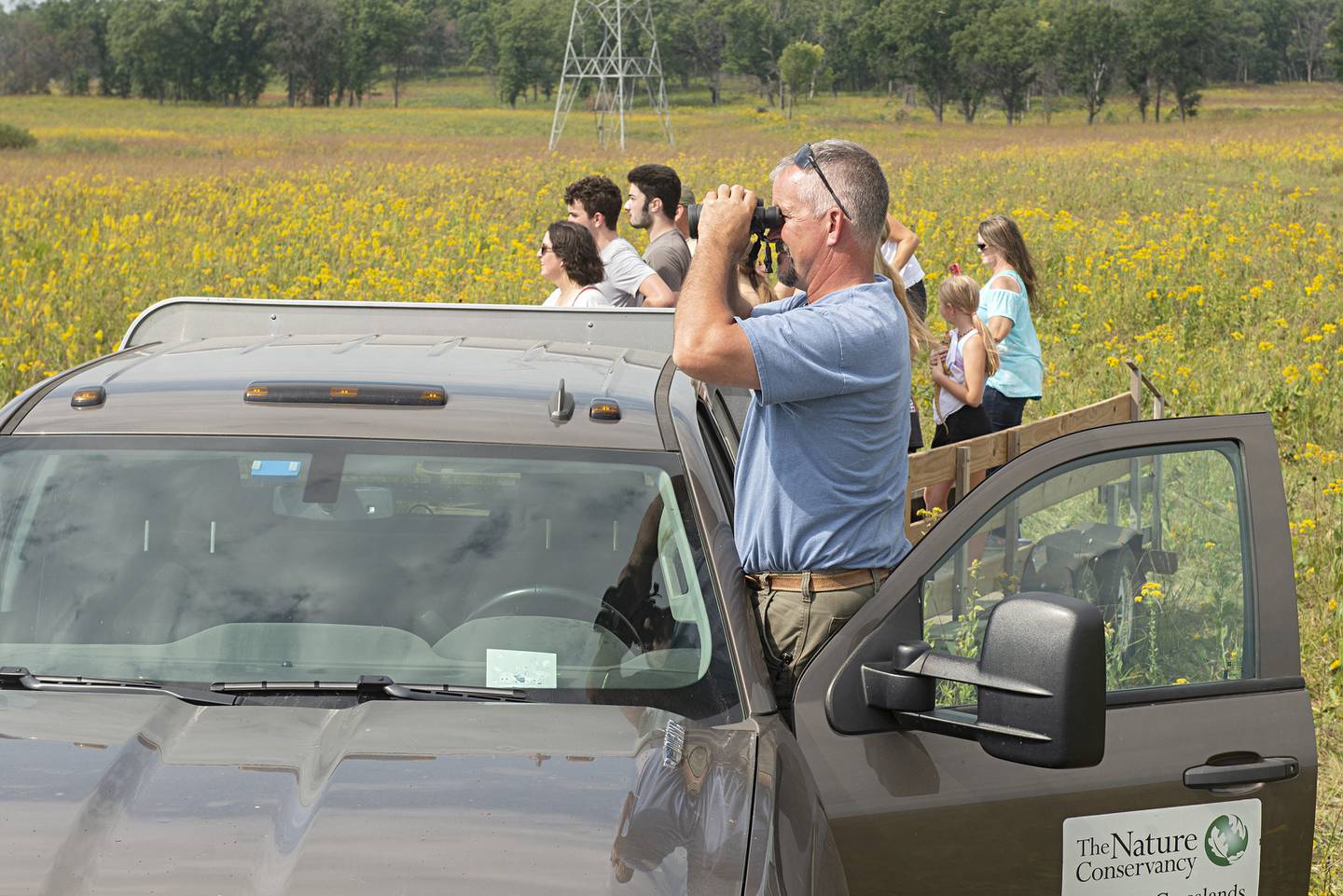 Visitors check out the bison herd Saturday  at  Nachusa Grasslands’ annual Autumn on the Prairie.