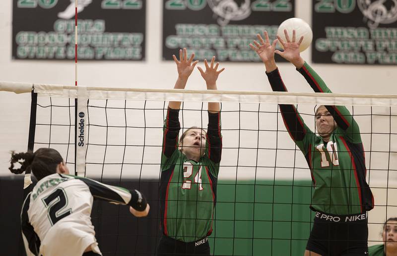 Lasalle-Peru’s Jordan Whaley (left) and Kelsey Frederick goes up to block a shot against Rock Falls’ Kaltrina Lecaj Wednesday, Sept. 4, 2024, at Rock Falls High School.