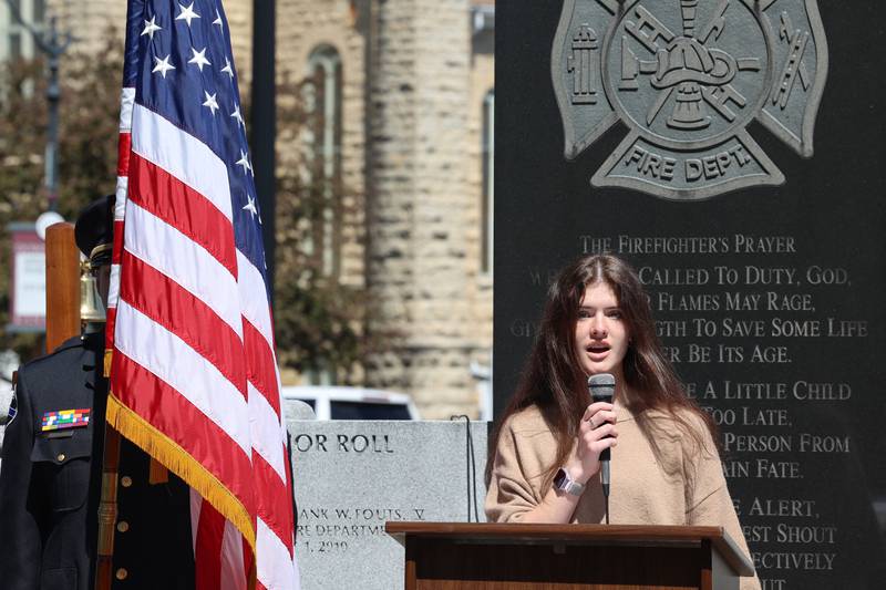 Manteno High School student Olivia Zwirkoski sings the national anthem during the Kankakee County Law Enforcement Memorial on Thursday, May 14, 2026, at the Kankakee County Courthouse.