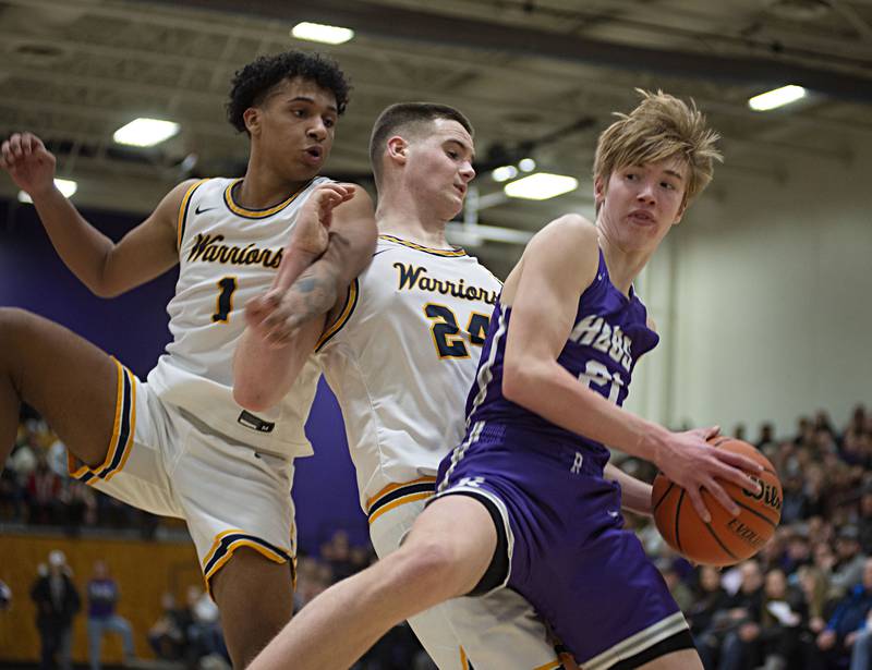 Rochelle's Eli Luxton pulls down a rebound against Sterling in the regional finals Friday, Feb. 25, 20212.