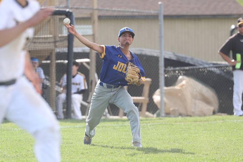 Joliet Central’s Nathan Maldonado throws to first for the out against Joliet West on Tuesday, May 9, 2023 in Joliet.