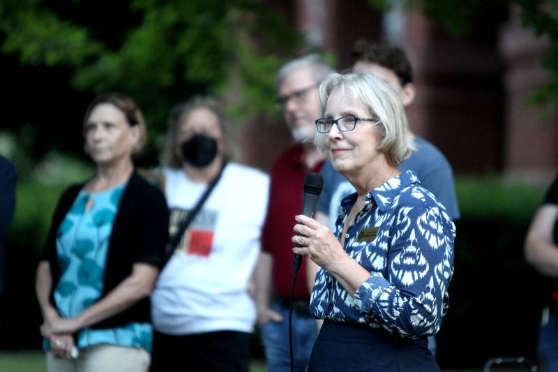 Kane County Board Chairman Corinne Pierog speaks during a candlelight vigil Wednesday, July 6, 2022, at the Kane County Courthouse in Geneva. The vigil was called to join in solidarity in honor of the mass shooting at a Fourth of July parade in Highland Park.