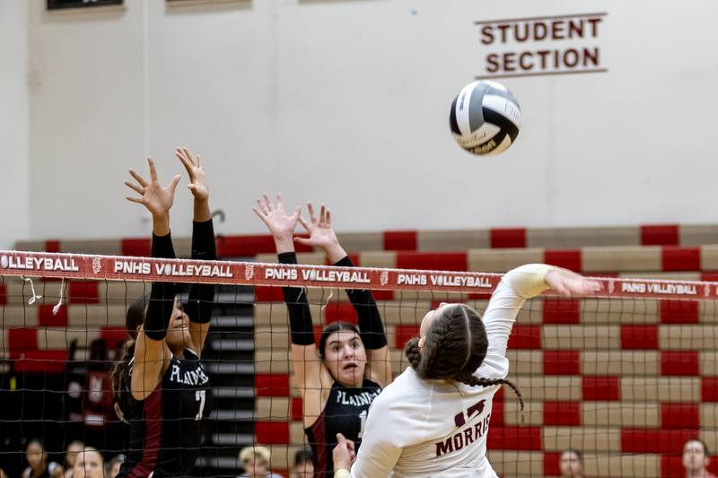 Morris's Olivia Peterson attempts a spike during a varsity volleyball away game against Plainfield North on Sept. 2, 2025.