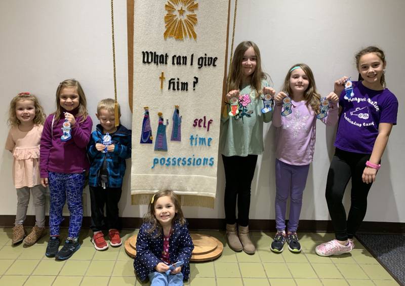 First Lutheran Church Sunday School students made ornaments and goodie bags for food pantry clients.