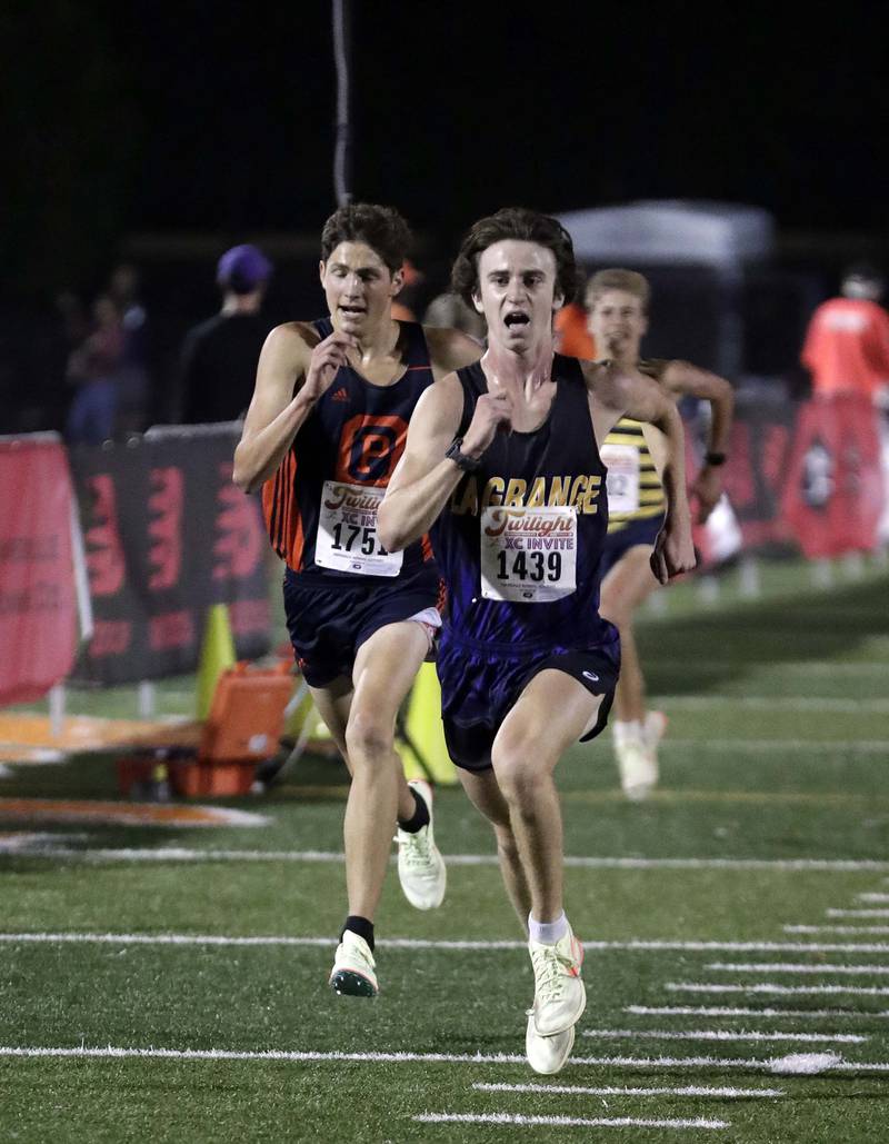 Photos Naperville North's Twilight Invitational cross country meet
