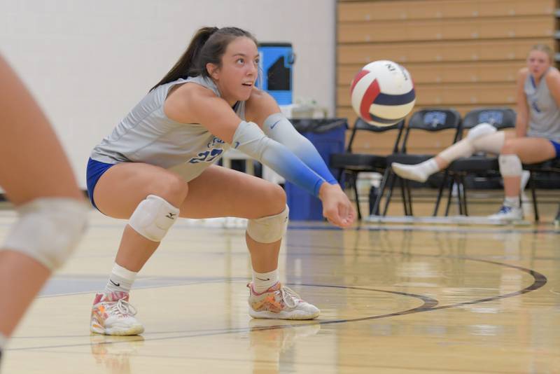 St. Charles North's Haley Burgdorf (23) returns a sever from Benet during a game on Wednesday, September 20, 2023.