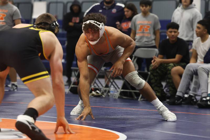 Romeoville’s Mason Gougis faces off with Joliet West’s Korey Koser in a dual meet on Thursday, Dec.14th, 2023 in Romeoville.