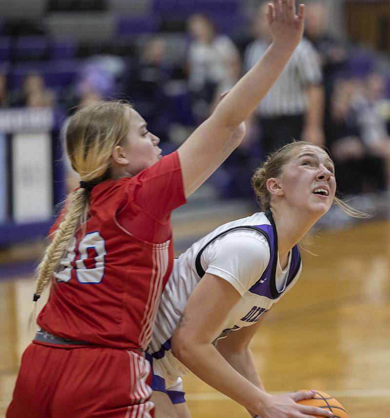 Dixon’s Addy Lohse works below the basket against Oregon’s Airael Schutz Thursday, Jan. 15, 2026.