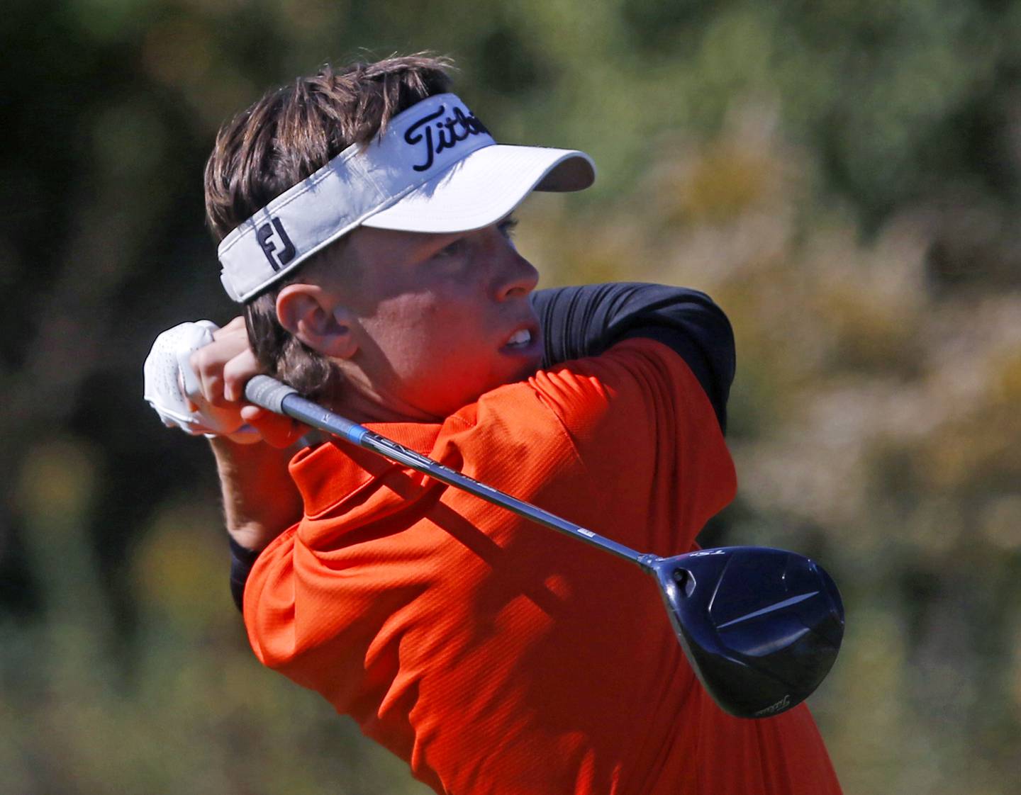 Crystal Lake Central’s Jack Bice watches his tee shot in the seventh hole during the IHSA Class 3A Jacobs Sectional golf tournament on Monday, Oct. 7, 2024, at Randall Oaks Golf Club in West Dundee.