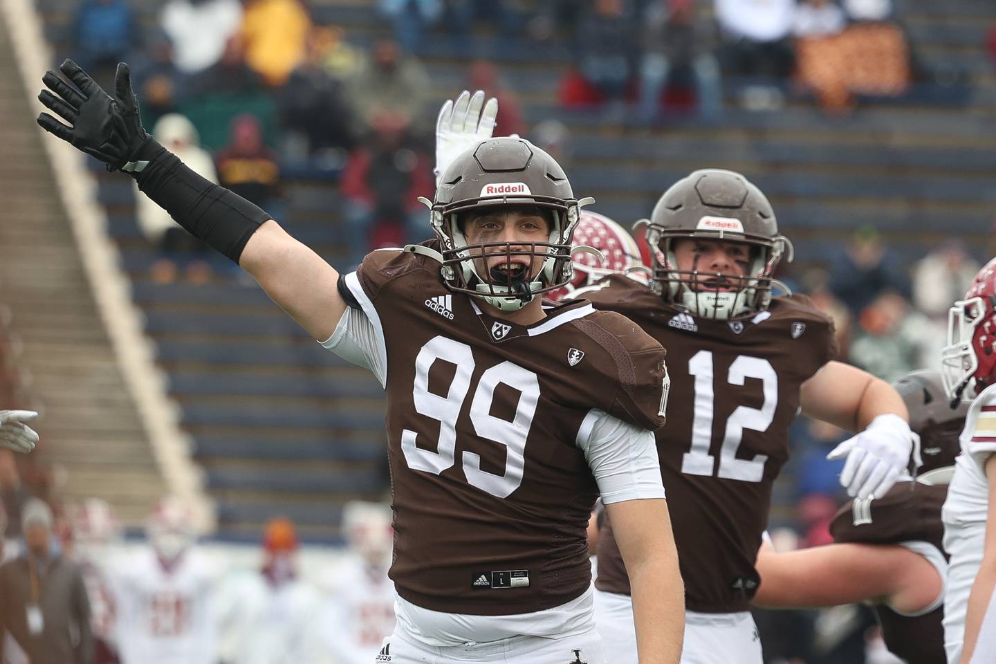 Ian Campbell signals Joliet Catholic possession after a Morris fumble in the Class 5A semifinal on Saturday, Nov. 23, 2024.