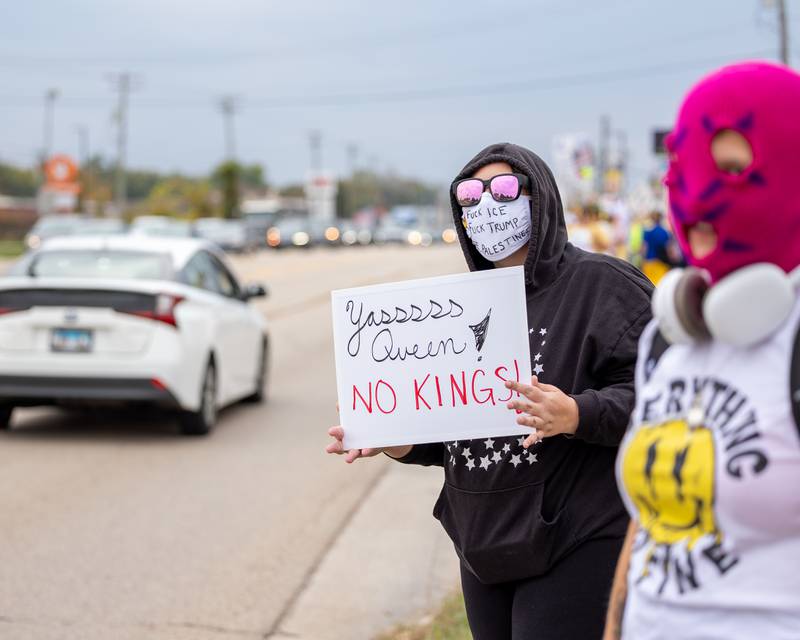 Protesters hold signs on side of I 47 at the ‘No Kings 2.0’ Protest on Saturday, October 18, 2025 on North Division Street in Morris.
