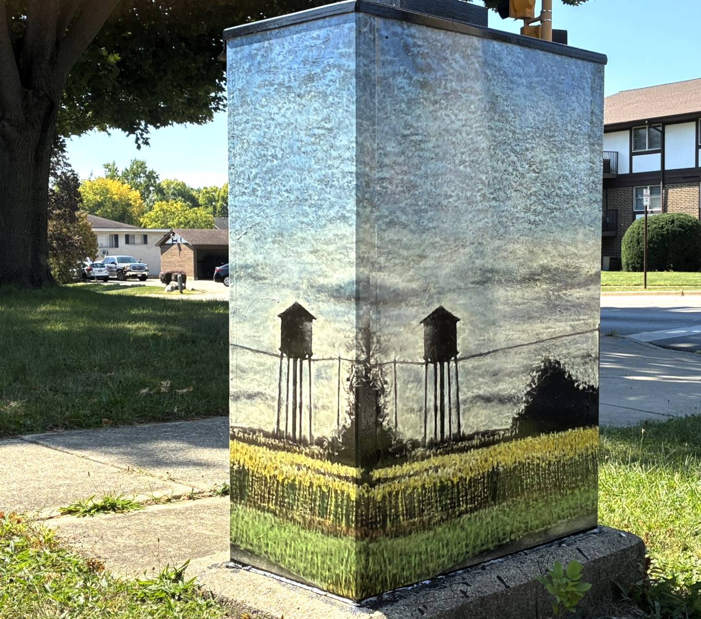 The painting “Old Del Monte Tower with Corn” by Charlie B. Thorne of DeKalb is featured on the utility box mural at North First and Pine streets in DeKalb.