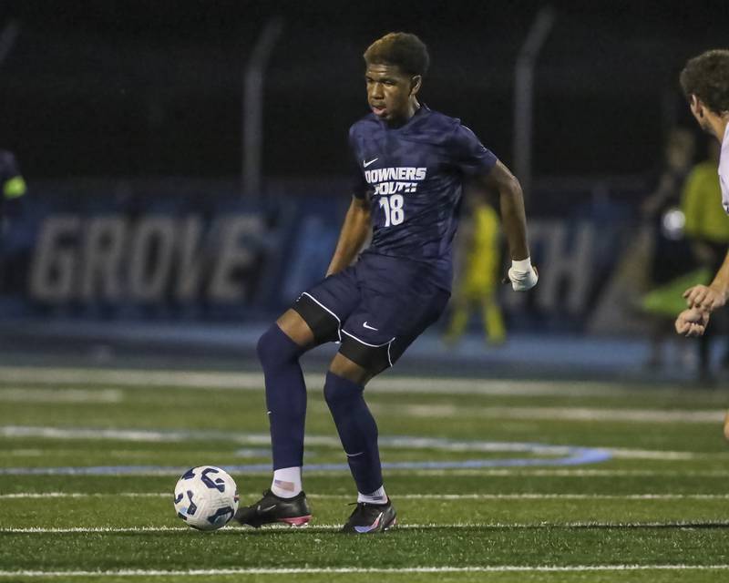 Downers Grove South's Zeke Hall-Taylor (18) passes the ball during soccer match between Downers Grove North at Downers Grove South. Oct 2, 2025.