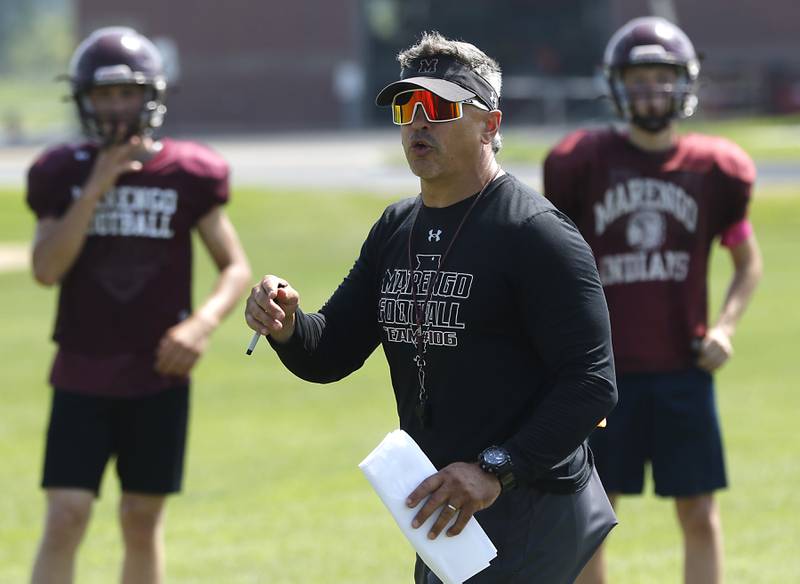 Marengo Head Coach Paul Forsythe  instructs his team during football practice on Tuesday, July 22,  2025, at Marengo High School.