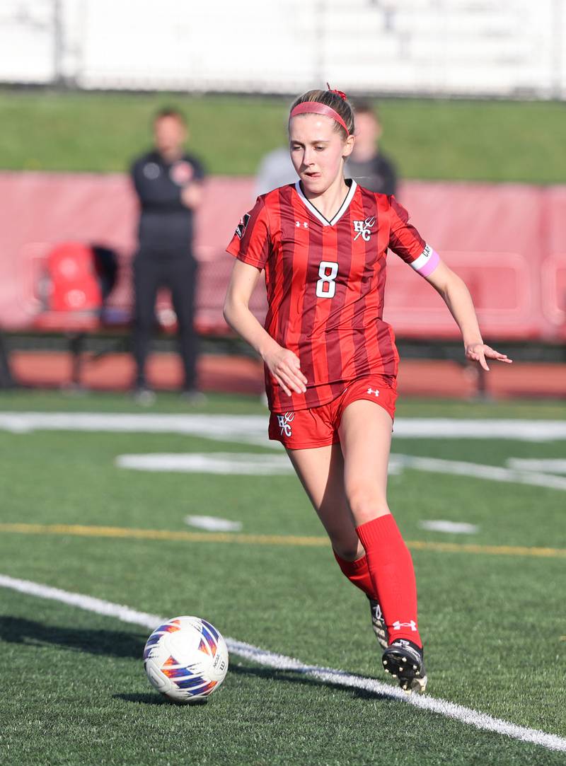 Hinsdale Central's Madelyn Panveno (8) tracks down the ball during the girls varsity soccer match between Lyons Township and Hinsdale Central high schools in Hinsdale on Tuesday, April 18, 2023.