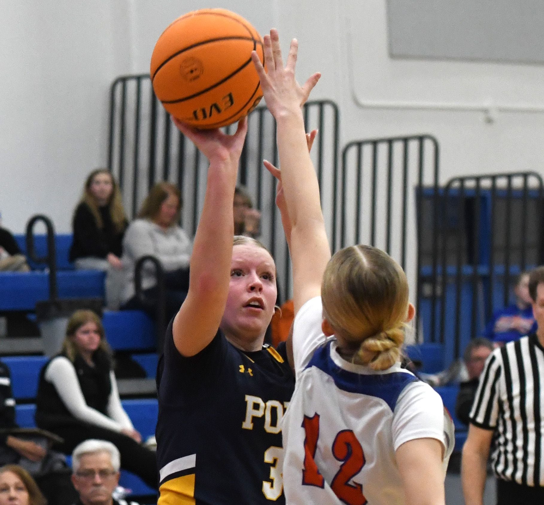 Polo's Carlee Grobe shoots as Eastland's Celeste Lower tries to get a piece of the ball on Tuesday, Feb. 10, 2026 at Eastland High School in Lanark.