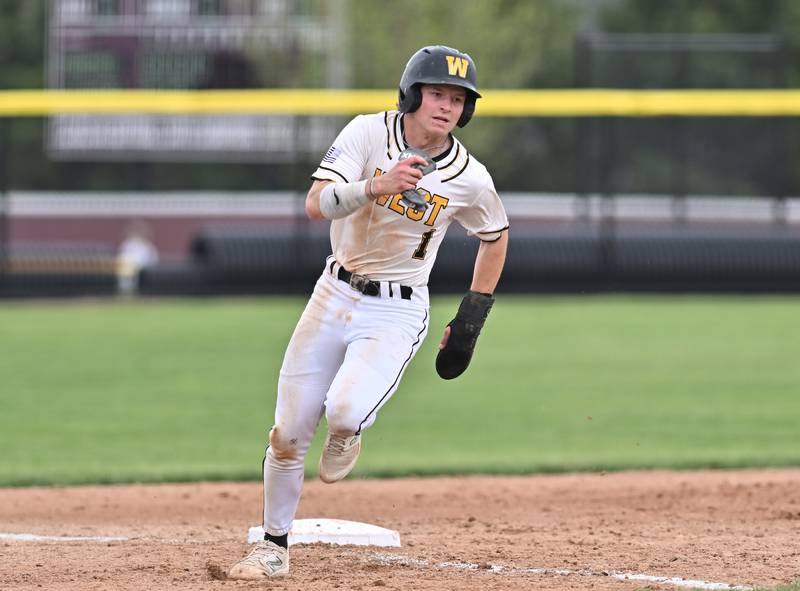 Joliet West's Cael Karczewski rounds third base during the non-conference game against Lockport on Saturday, April. 27, 2024, at Lockport.