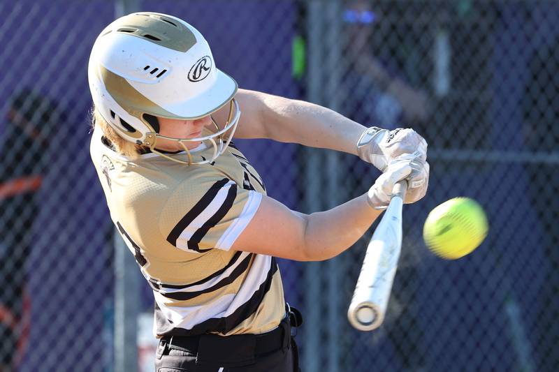 Sycamore's Ema Durst makes contact Monday, April 15, 2024, during their game against Rochelle at Rochelle High School.