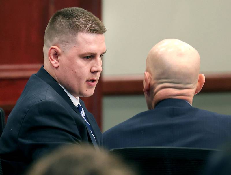 Former police officer James Corralejo (left) talks to his attorney Gary Johnson after his sentencing Thursday, July 17, 2025, at the DeKalb County Courthouse in Sycamore. Corralejo was sentenced to four years in prison for a Class 2 felony count of driving under the influence of alcohol causing death for a 2023 crash that killed DeKalb woman Graciela Reza Contreras.