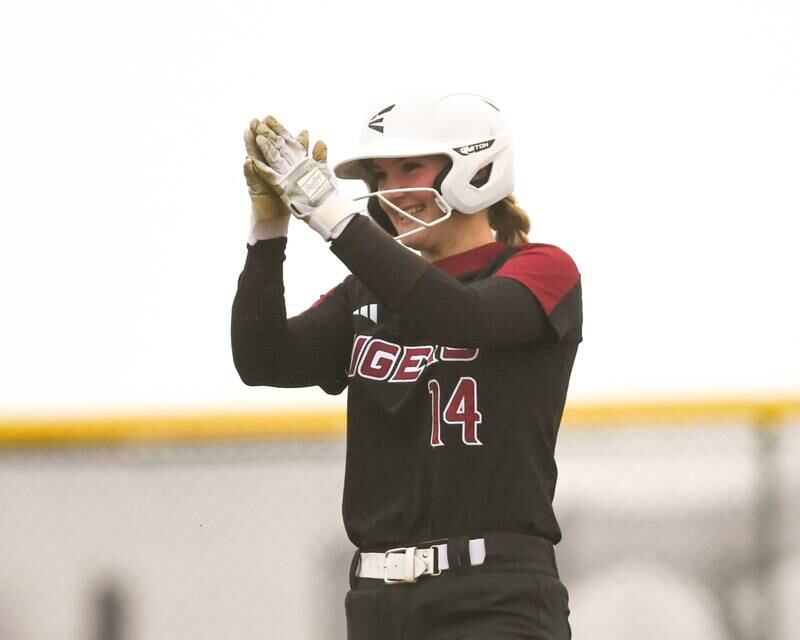 Plainfield North’s Makayla Conrad (14) celebrates a two base hit during the game on Thursday April 17, 2025, while traveling to take on Oswego East.