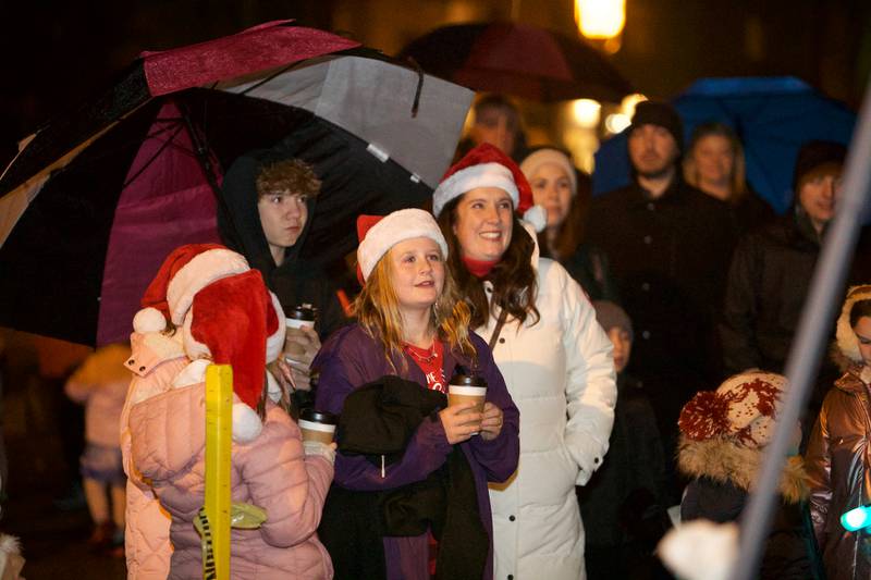 Families gather to wait for Santa to arrive at the Geneva Christmas Walk on Friday, Dec.1 2023 in Geneva.