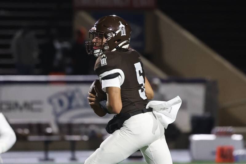 Joliet Catholic’s Andres Munoz looks to pass against Leo on Friday, Oct. 6, 2023 in Joliet.